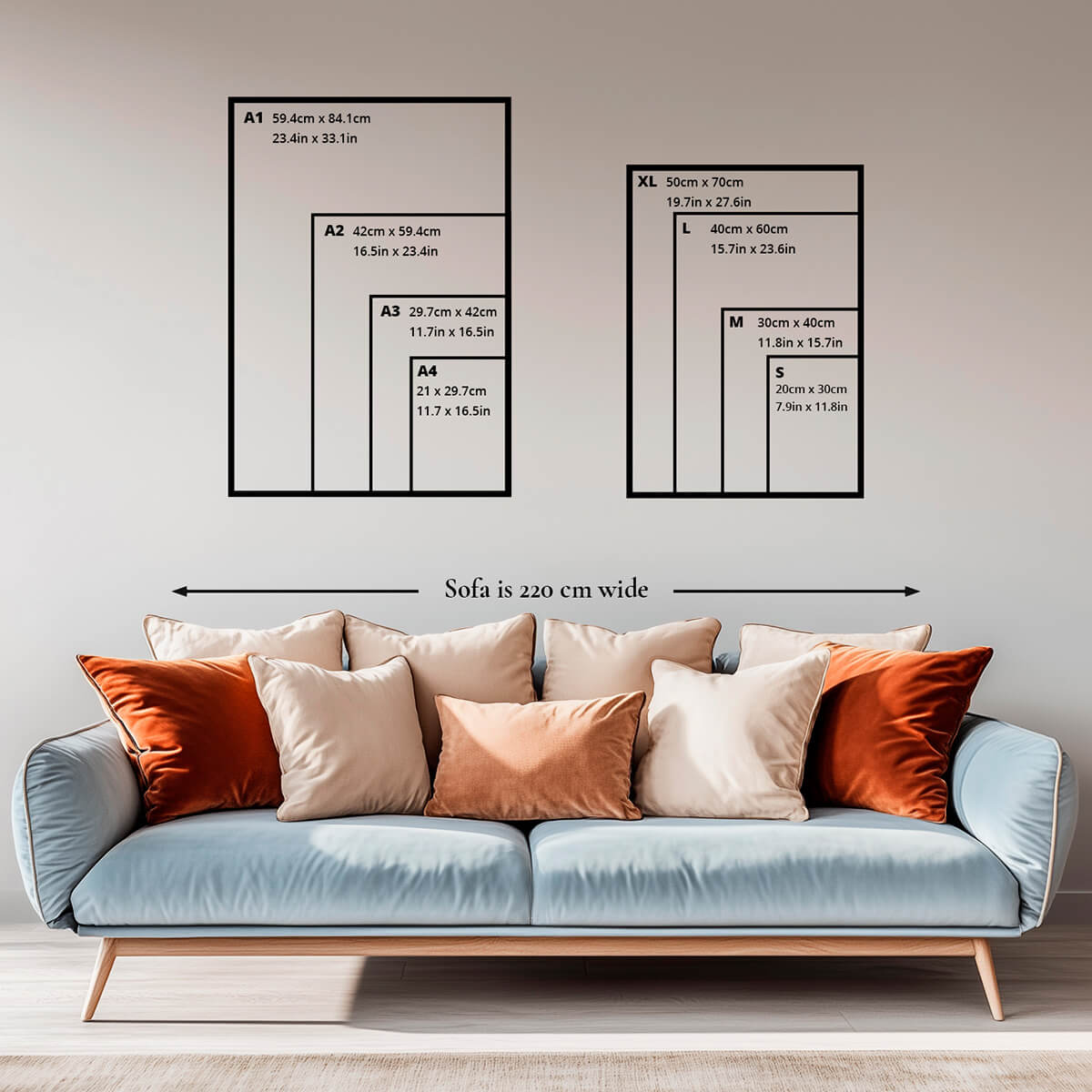 Poster print size guide displayed above a 220 cm wide sofa for reference.