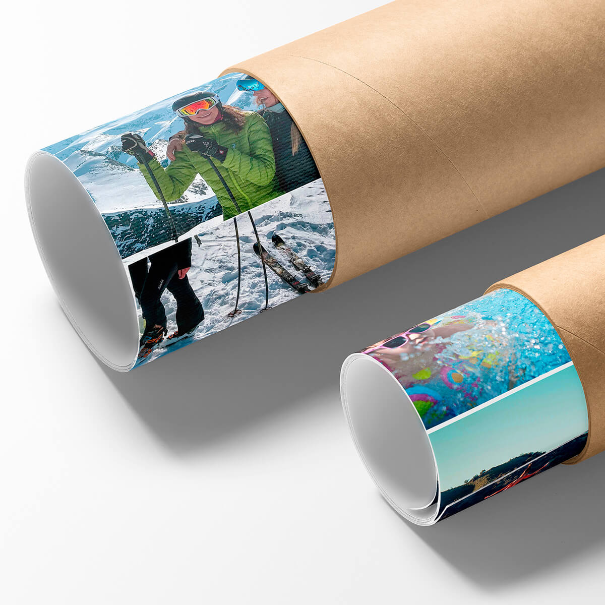 Rolled poster prints featuring various images, packed in cardboard tubes.