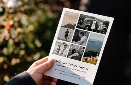 An elegant, black and white funeral order of service booklet with photo collage